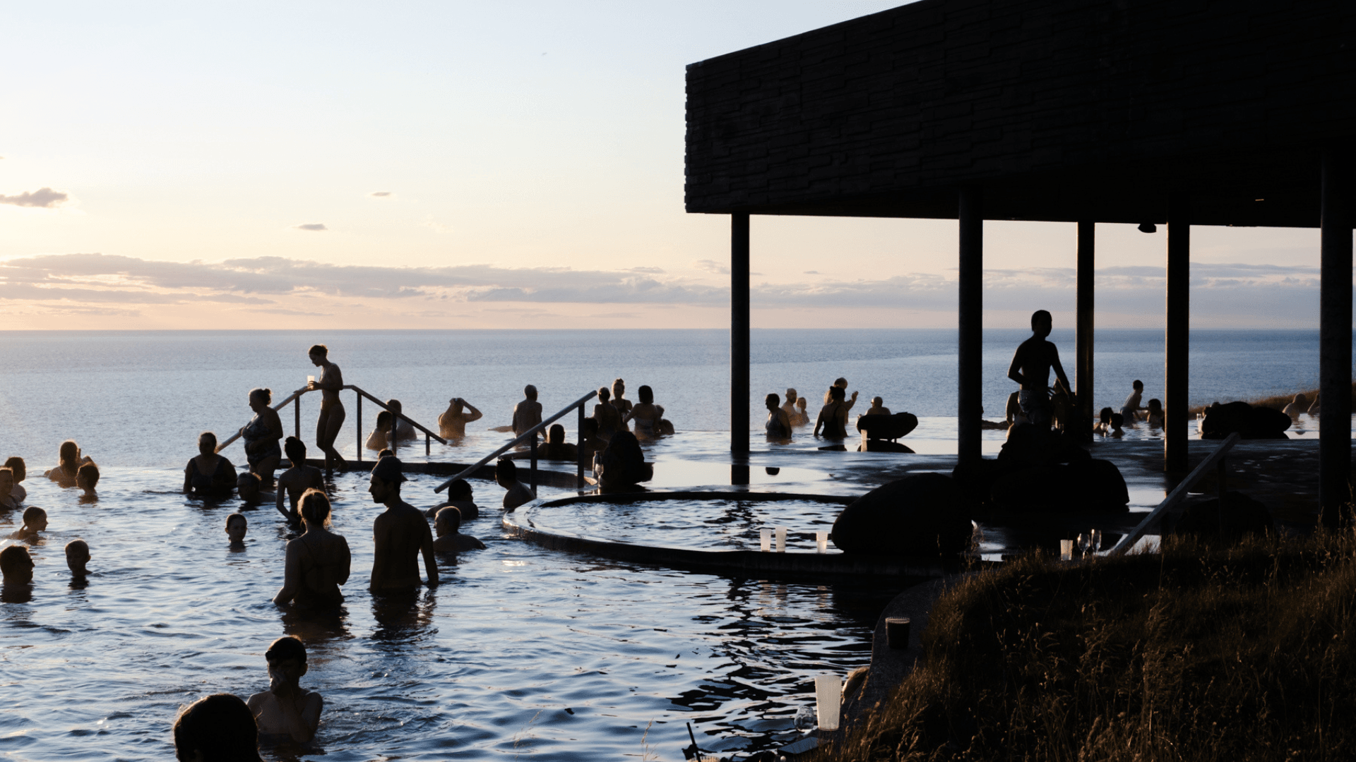 GeoSea Baths in Húsavík Iceland people bathing