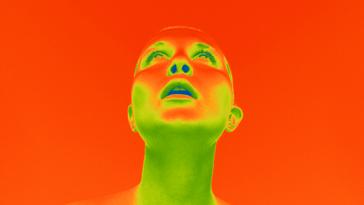 Picture of a woman's face looking skyward