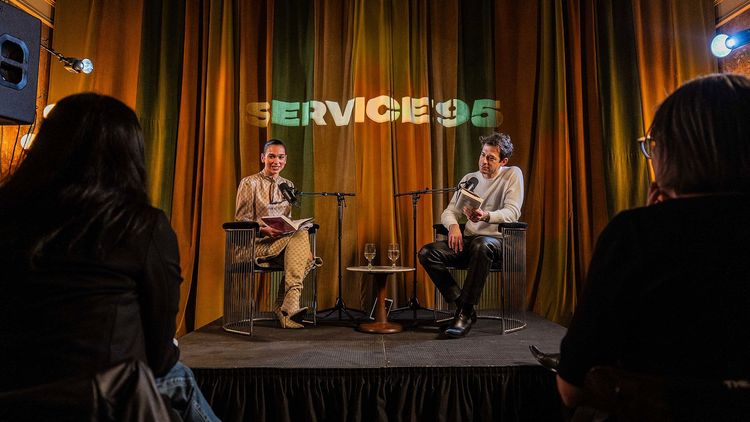 Dua Lipa & Mark Ronson recording a live version of the Service95 Book Club Podcast in New York