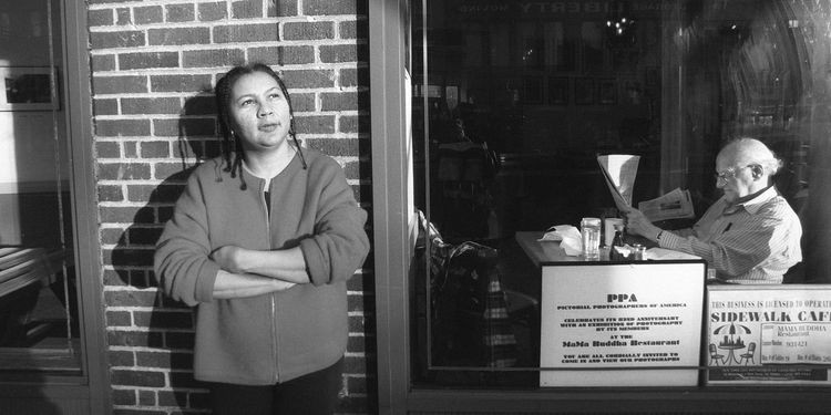 On bell hooks, Love & The Path To Real Connection Picture of bell hooks outside a cafe